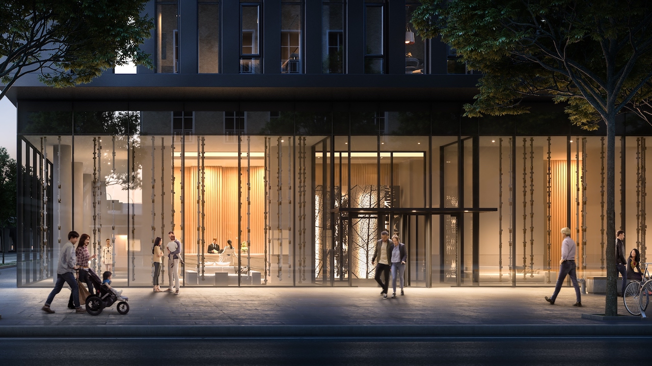 Rendering of Sugar Wharf Condos lobby entrance exterior view at night.