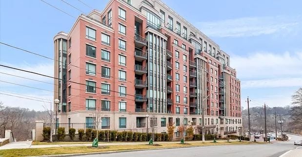 Exterior image of the Riverhouse at The Old Mill Condos in Toronto