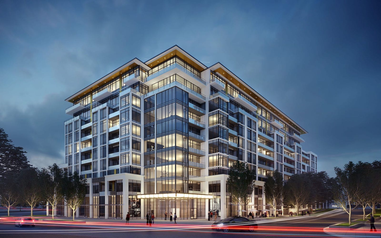 Exterior rendering of Distrikt Trailside condos at night.