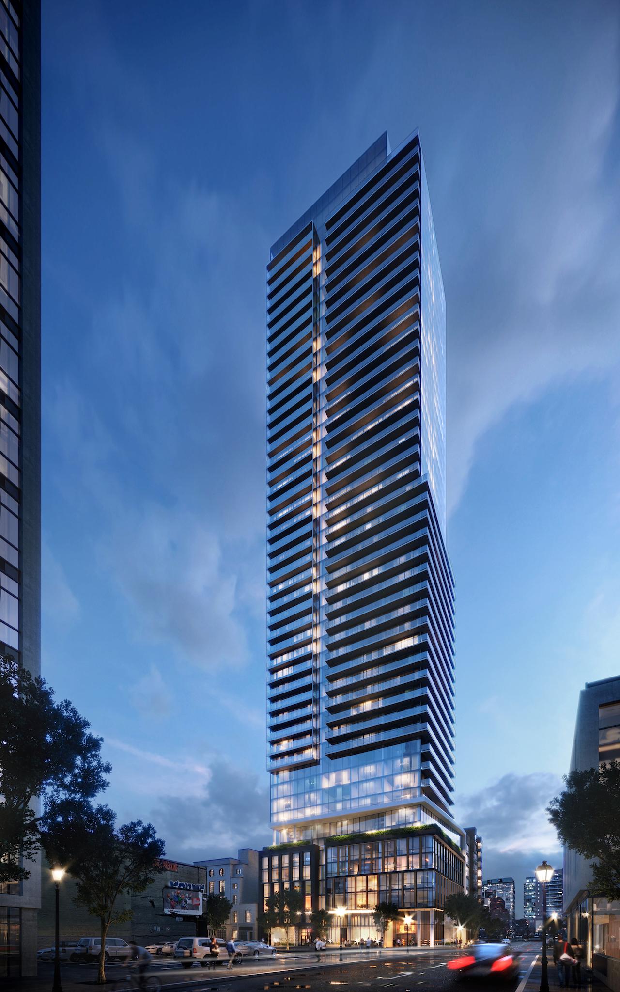 The Saint Condos full building exterior at night