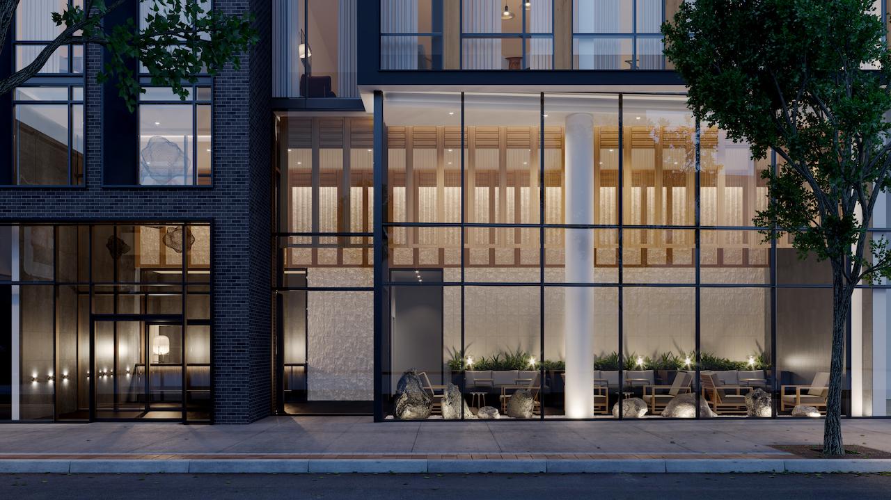 The Saint Condos lobby exterior at night
