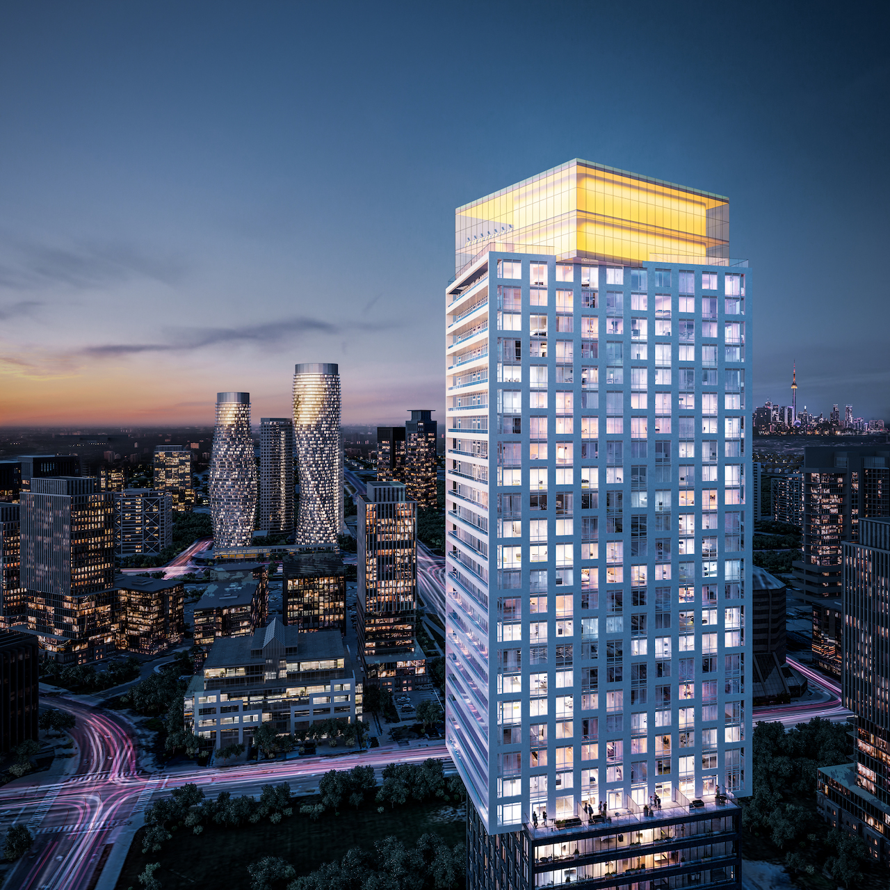 Exterior rendering of EX2 Condos at night.