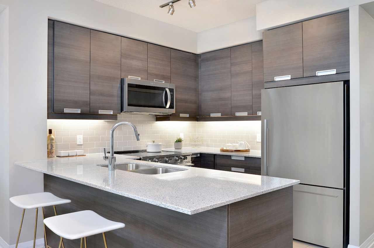 Interior rendering of Perla Towers condo suite kitchen.