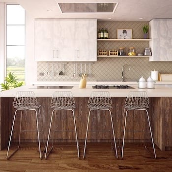 Image of a modern condo kitchen with white cabinets and countertops.