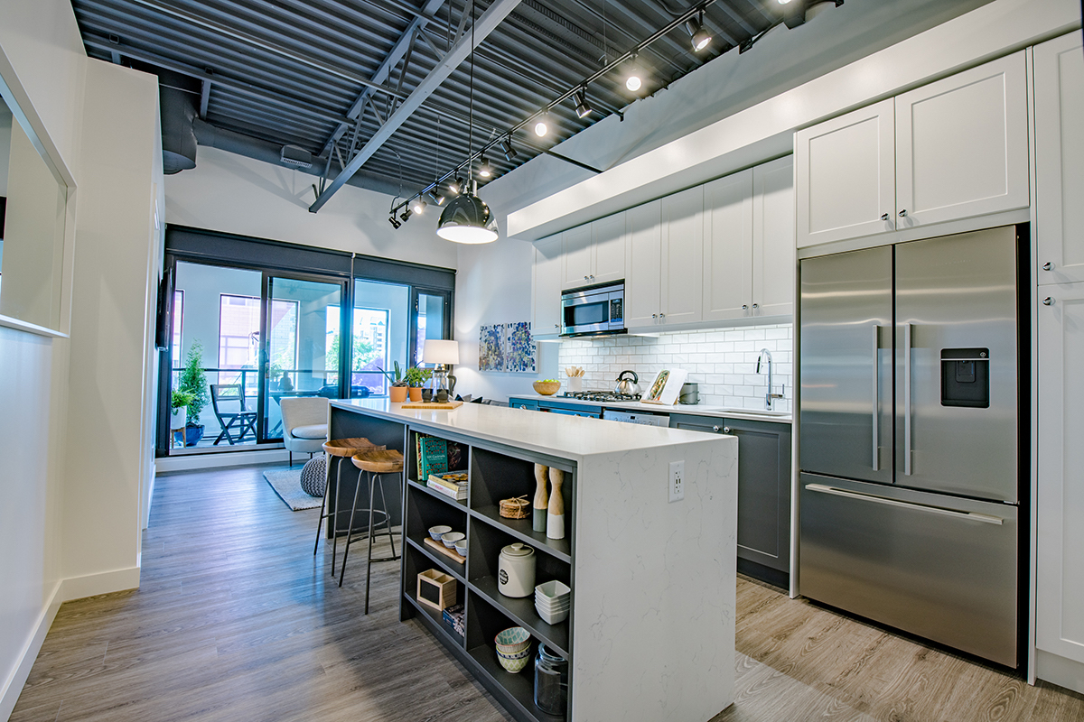 Thompson living area suite Interior rendering of The Annex Condos in Calgary.