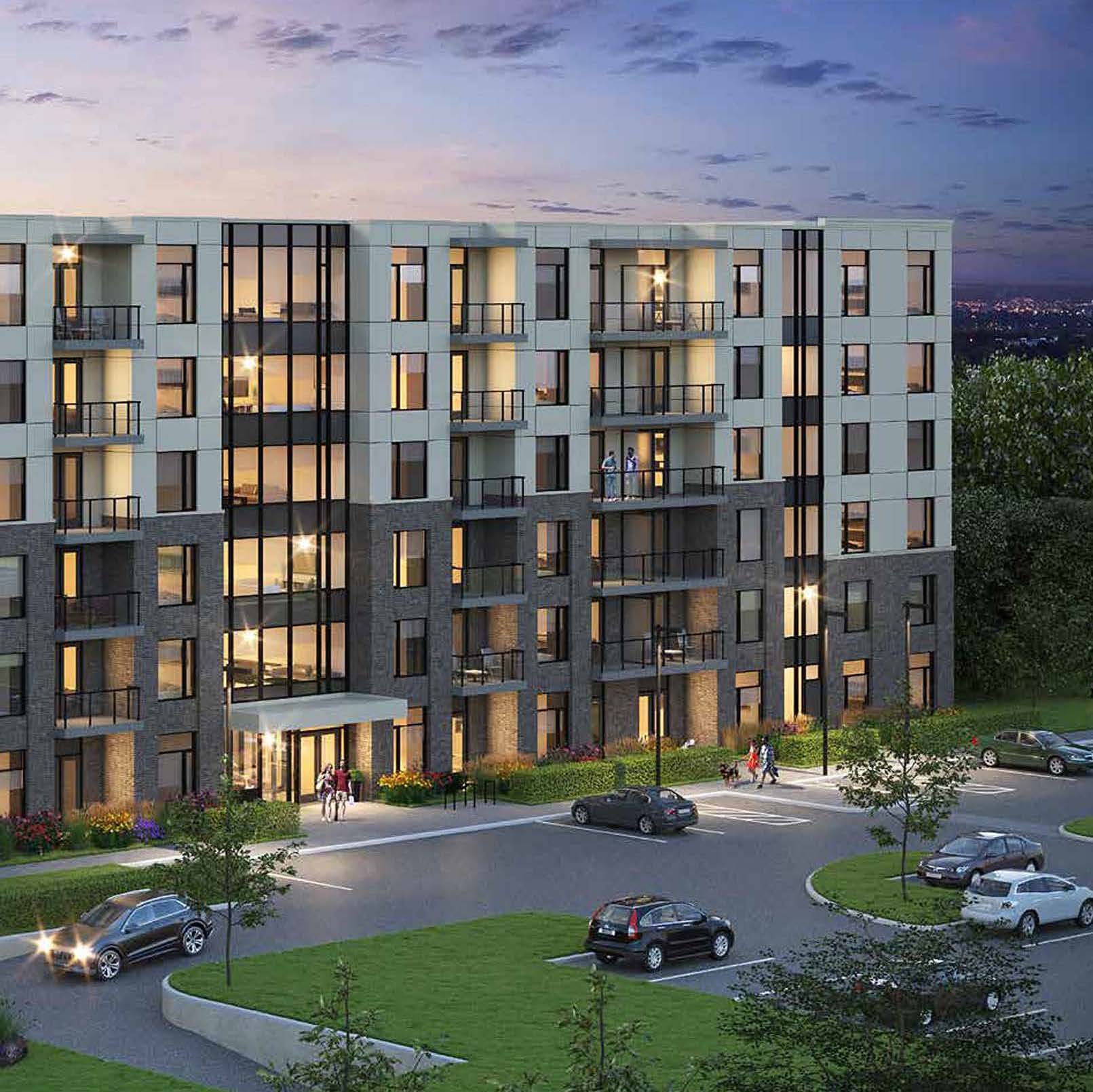 Rendering of Spur Line Common exterior at night and parking lot.