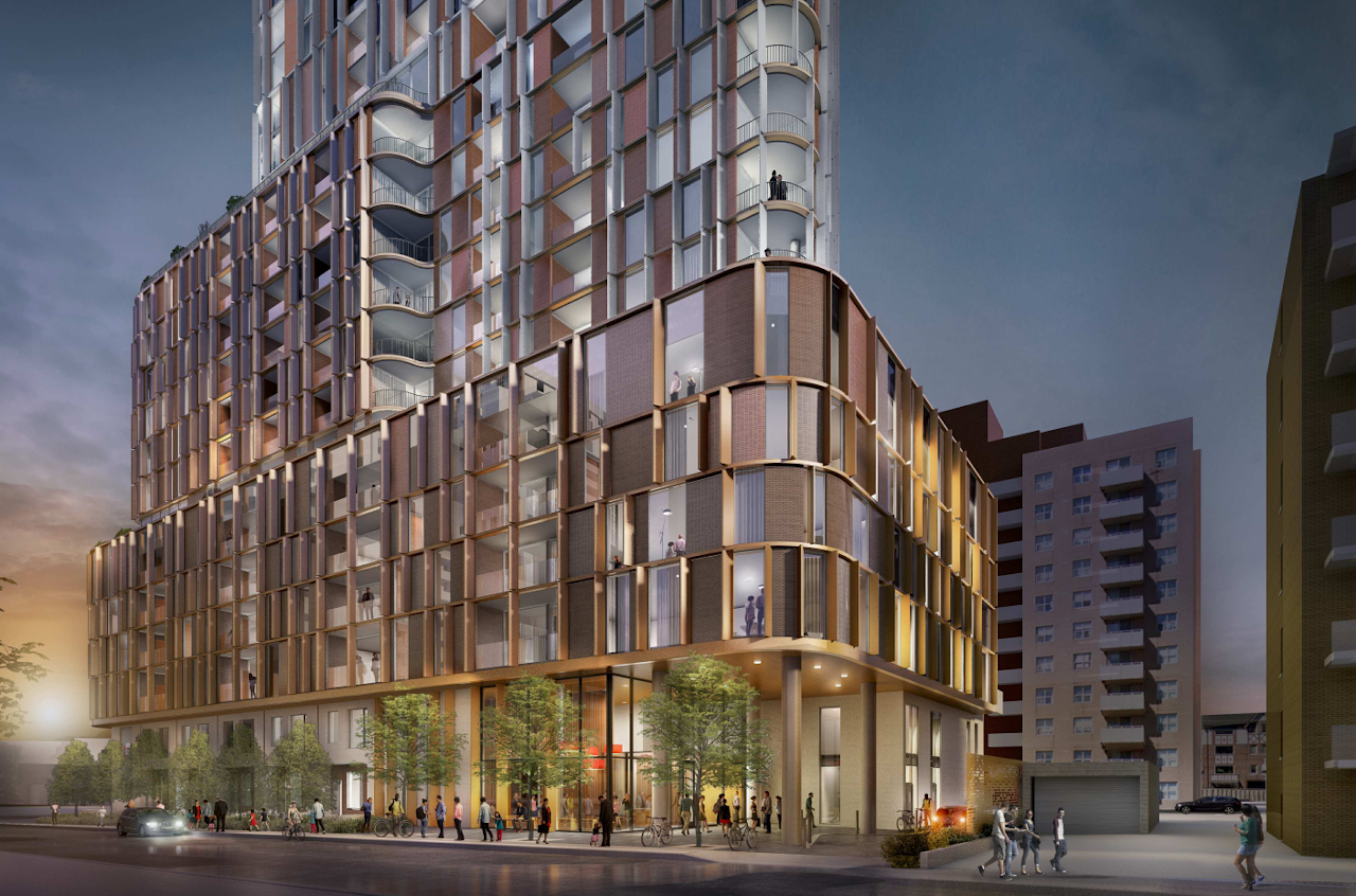 Podium exterior rendering of 32 Raglan Avenue Condos at night.