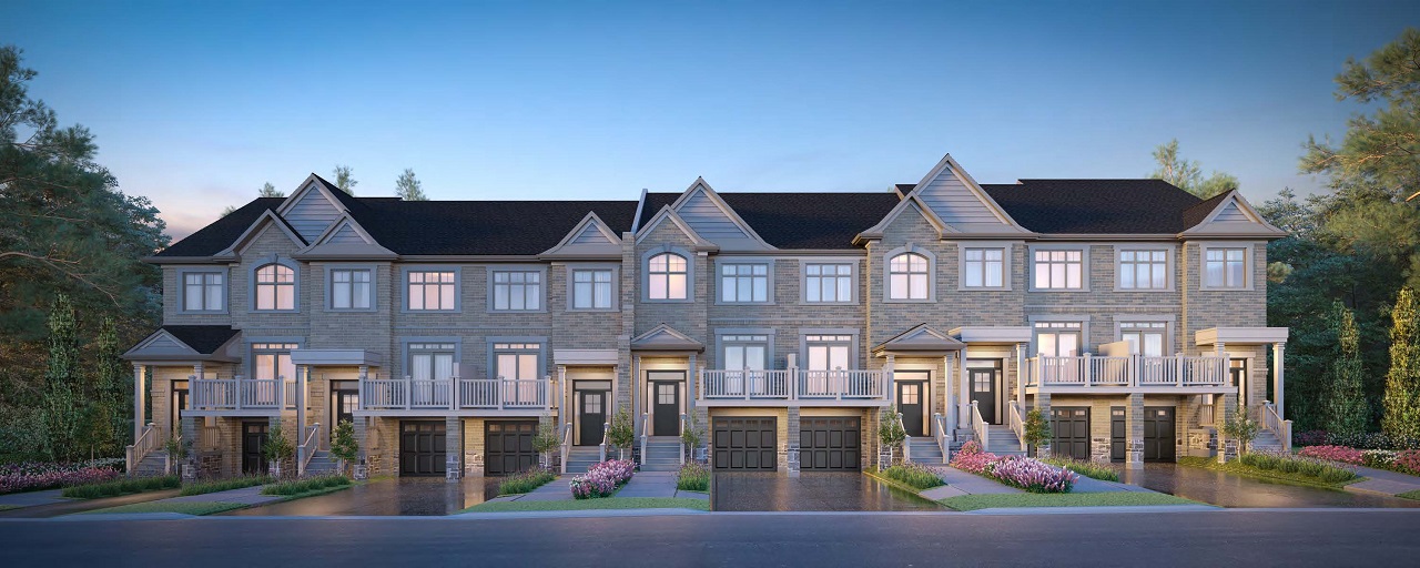 Exterior rendering of King East Estates townhomes at night.