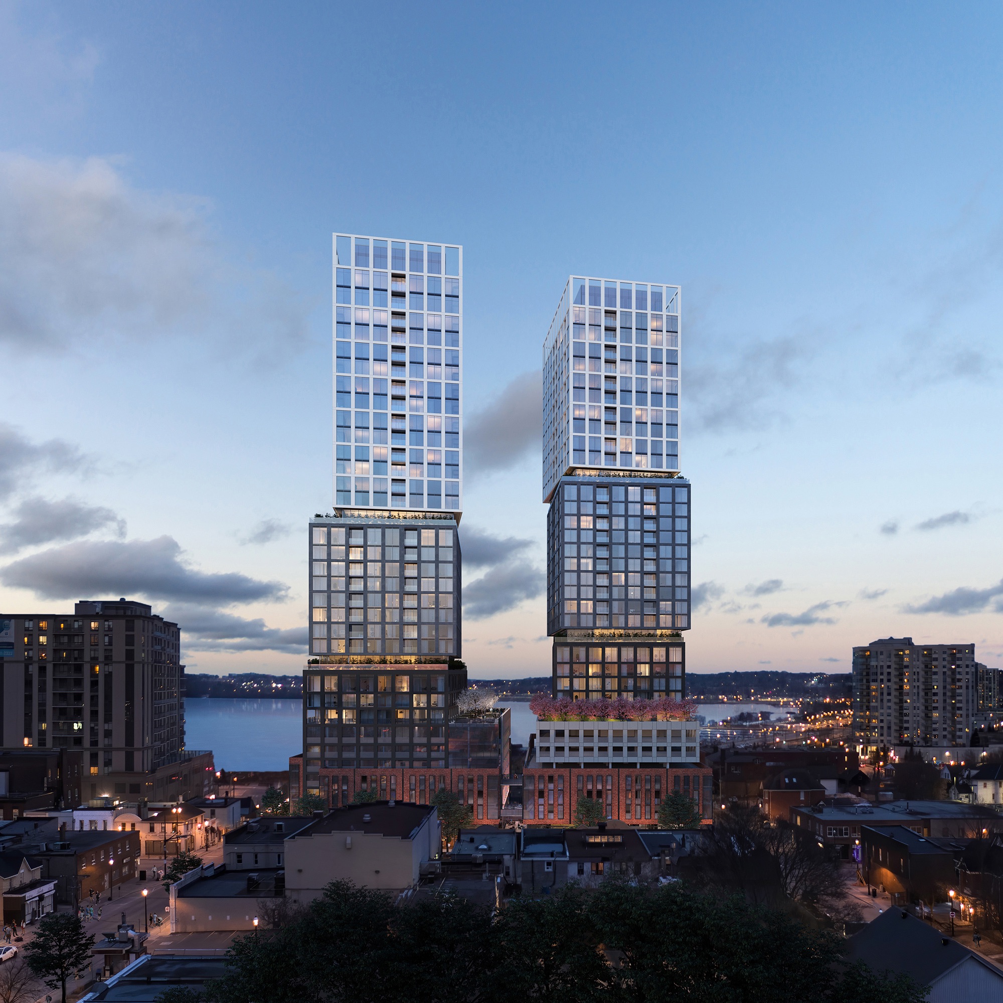 Rendering of Debut Waterfront Residences exterior at night.