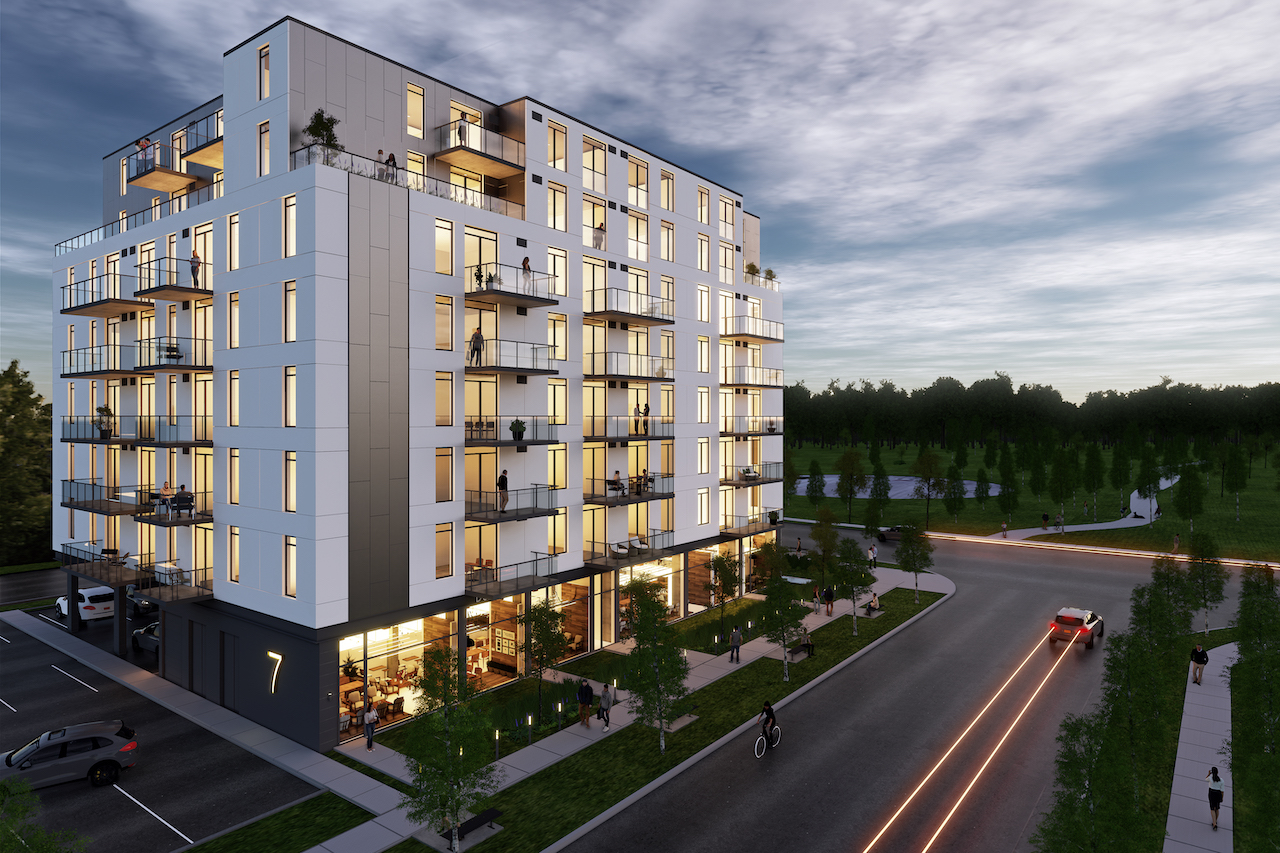 Rendering of Grand Bell Condos exterior at night.