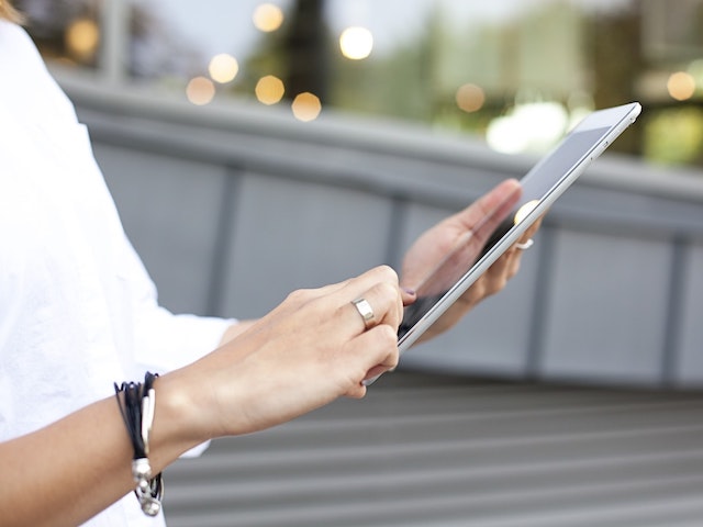 Person checking their email on an ipad