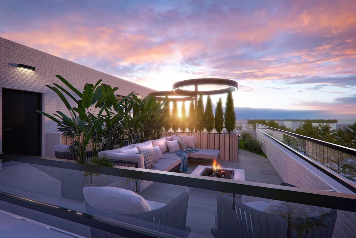 Rendering of Louie Condos rooftop terrace at dusk