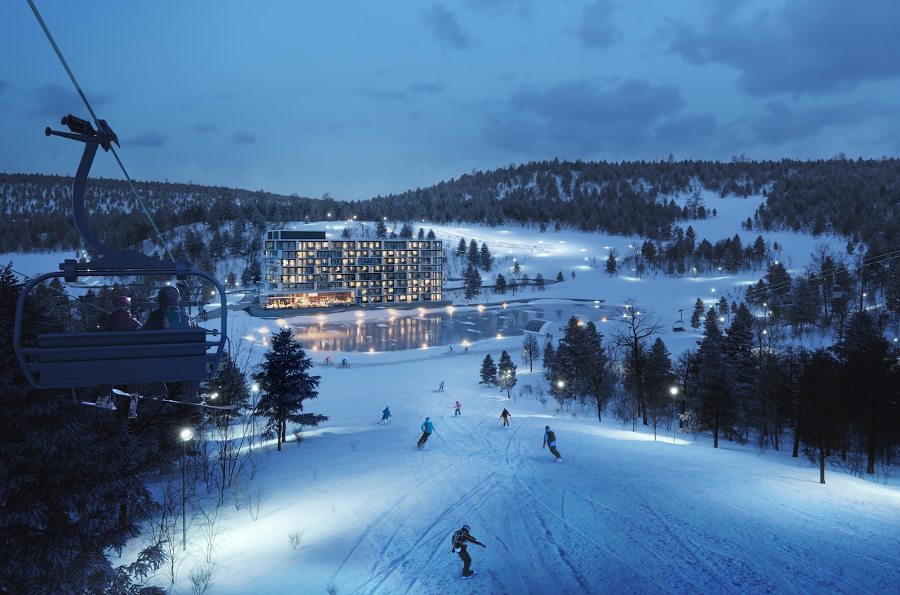 Aerial rendering of Horseshoe Residences at night in the winter.