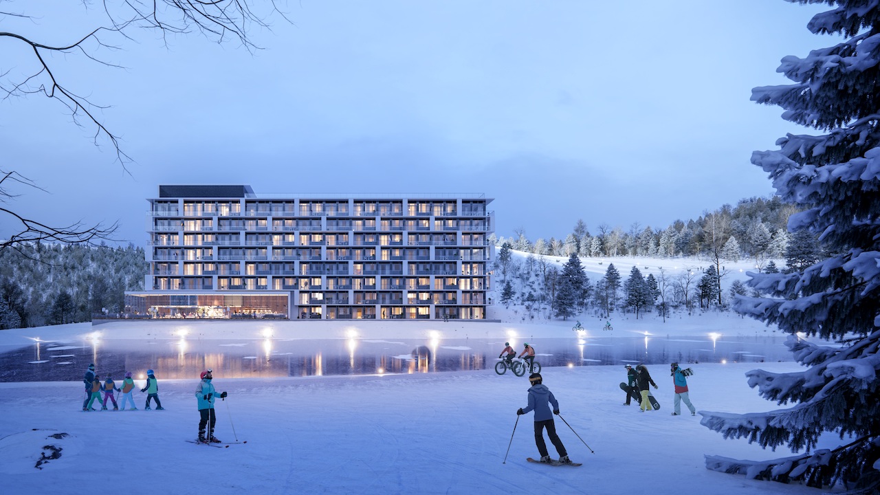 Aerial rendering of Horseshoe Residences in the evening during the winter.