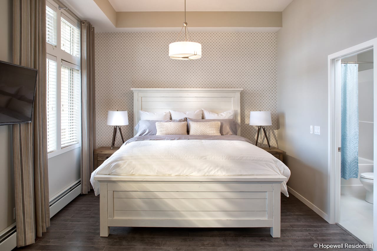Sandgate Mahogany Lake Condos guest suite bed