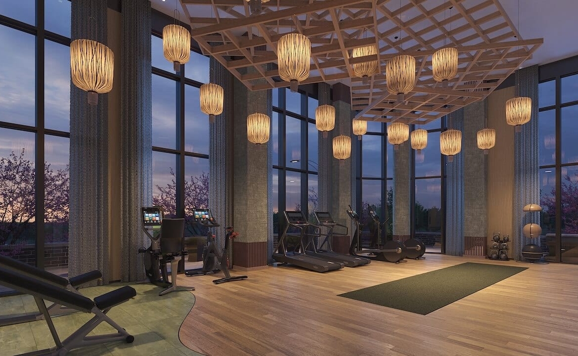 Rendering of Lily at Crosstown Condos gym at night